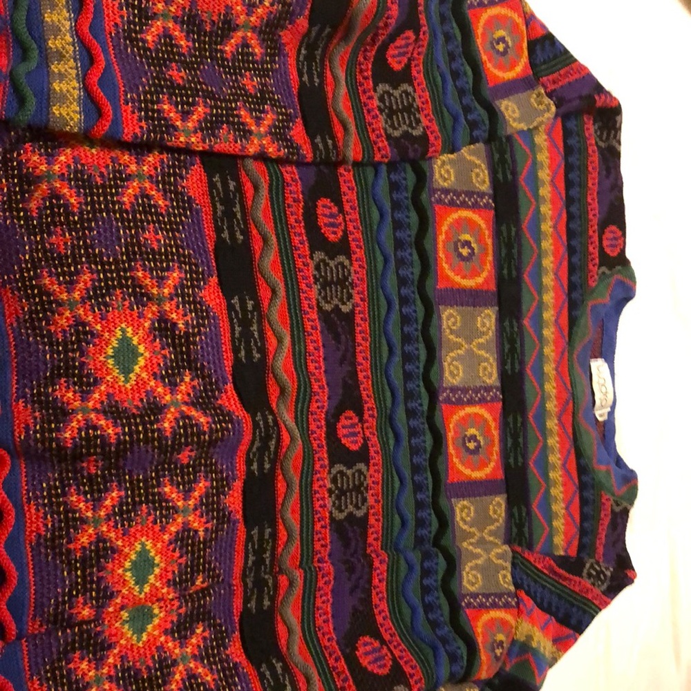 Tundra sweater multi color.  Excellent condition